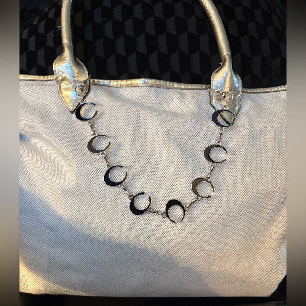Bag/Purse chain extender. This has 8 C this is Black & White 2 sided nwt